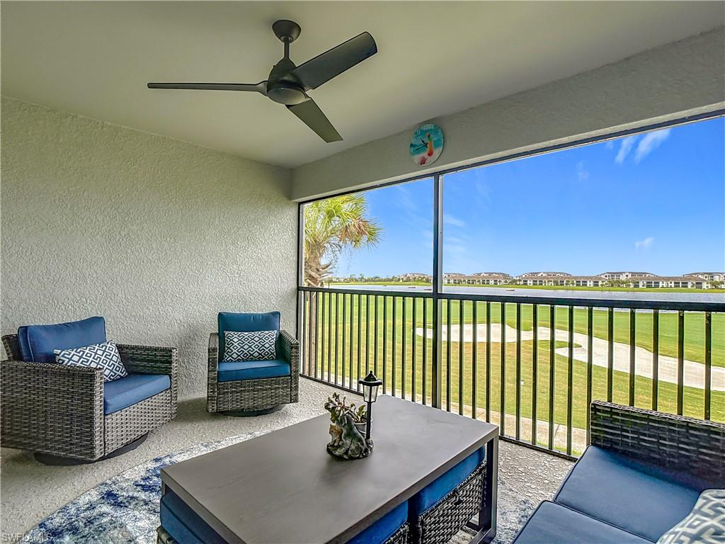 Sunroom / solarium with outdoor lounge area, a balcony, and ceiling fan
