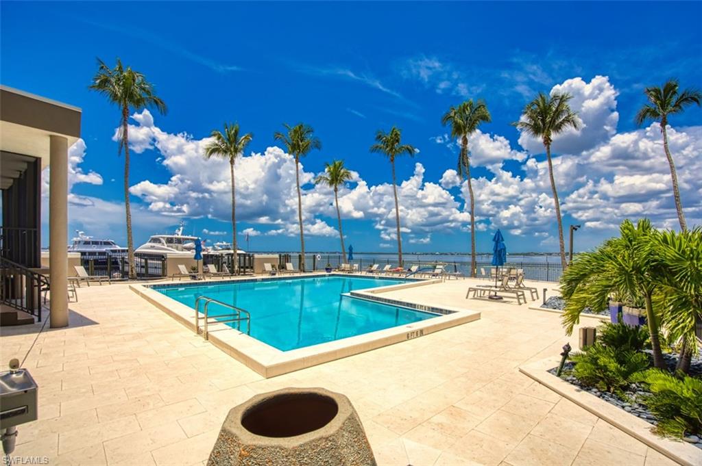 Community pool featuring a patio area