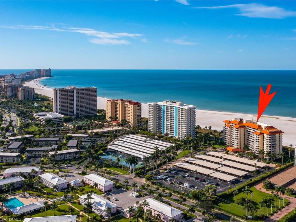 View of urban area with expansive beach