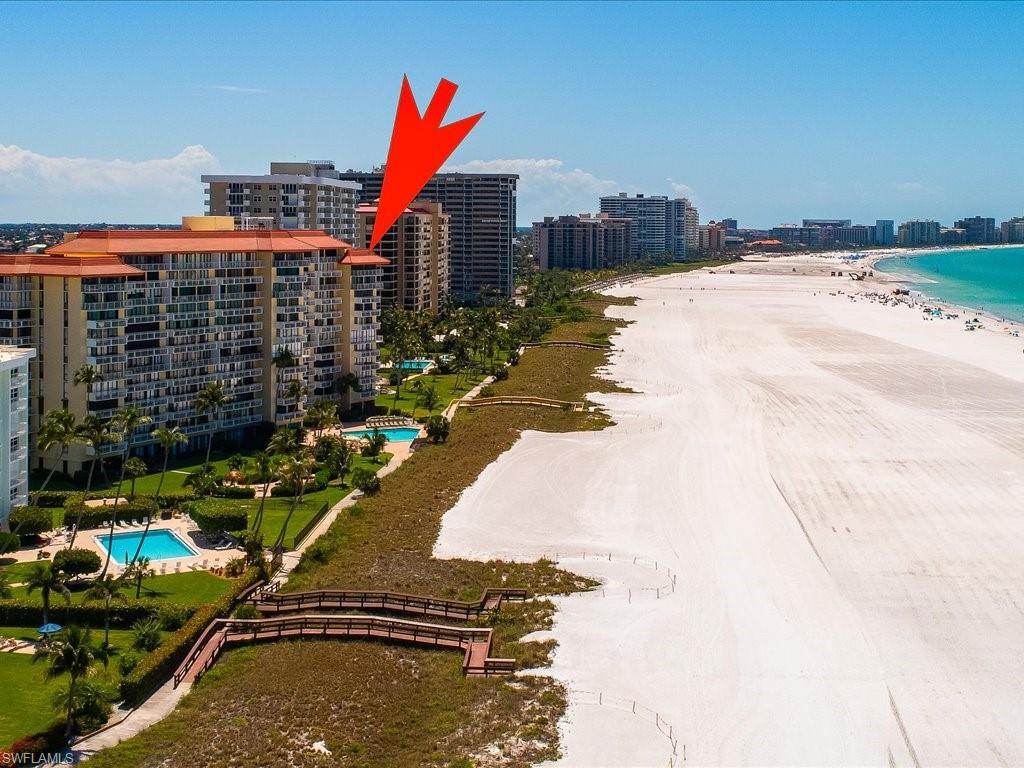 View of urban area with a pool area and unending shoreline