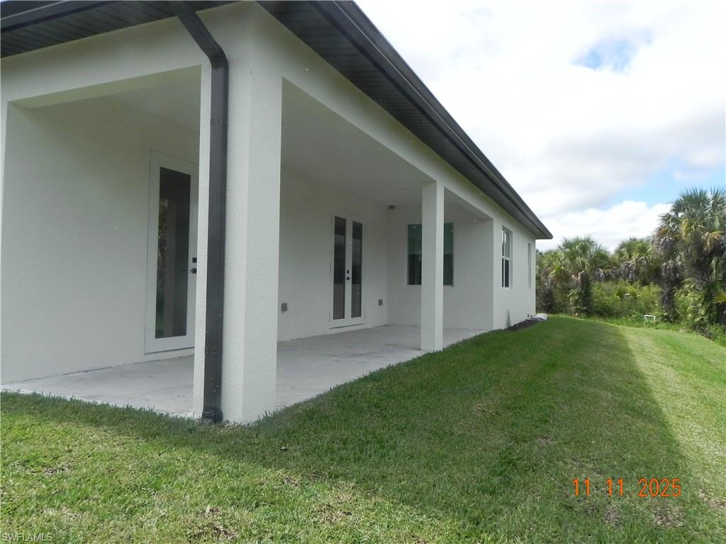 Rear View of house with Back Patio