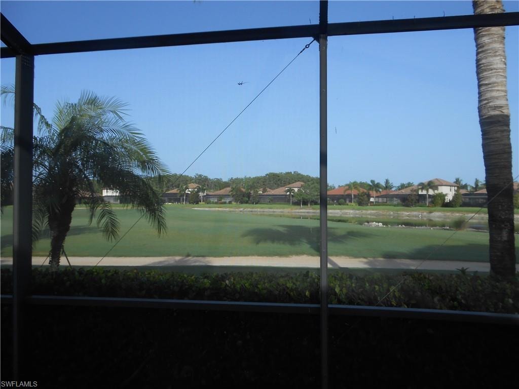 Water view with nearby suburban area