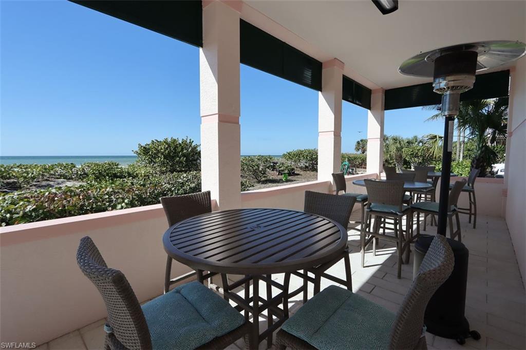 Balcony with outdoor dining space at community bldg