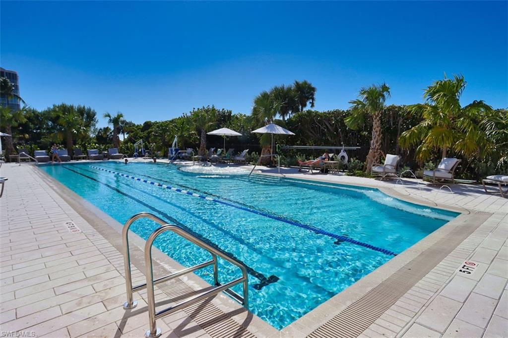 Community pool featuring a patio area