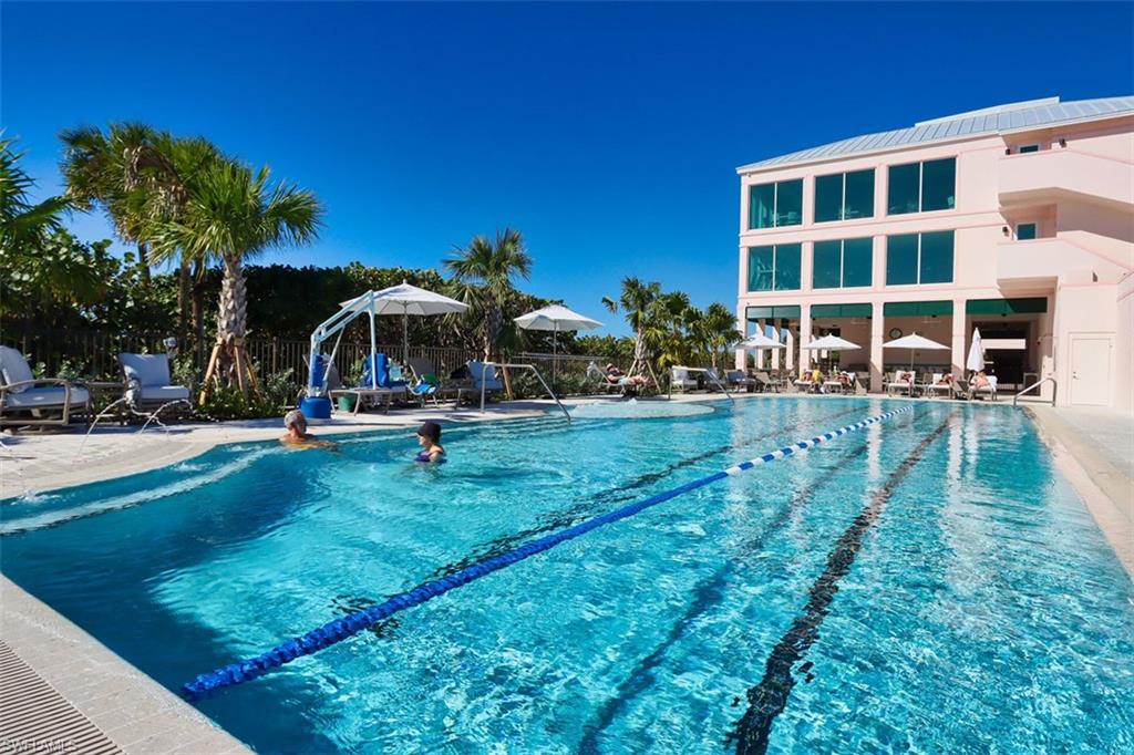Community pool featuring a patio