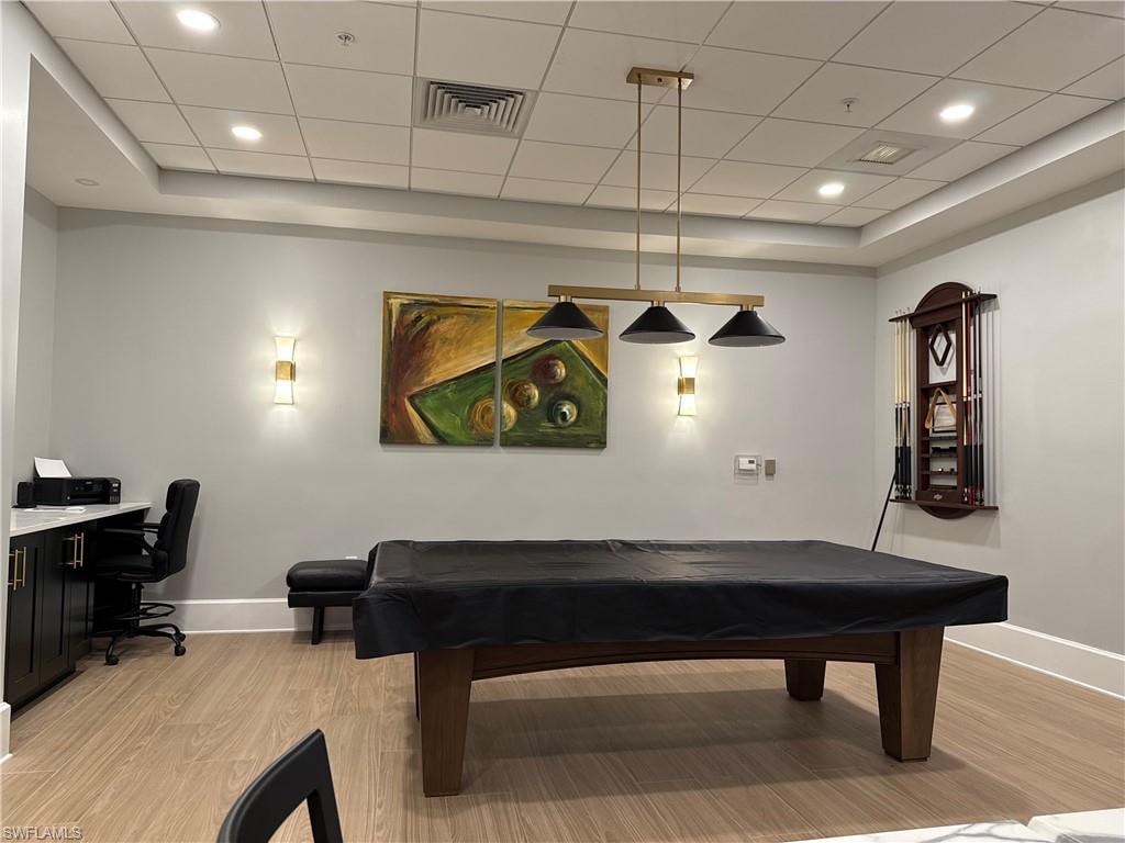 Community room with pool table, card tables &, an office area.