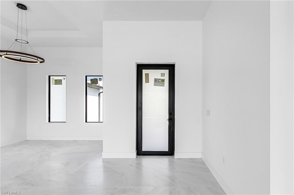 Spare room with baseboards