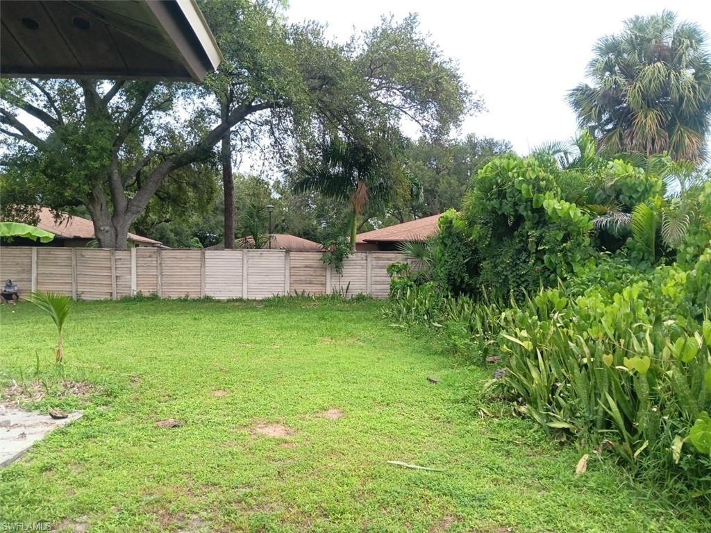 View of yard with view of scattered trees