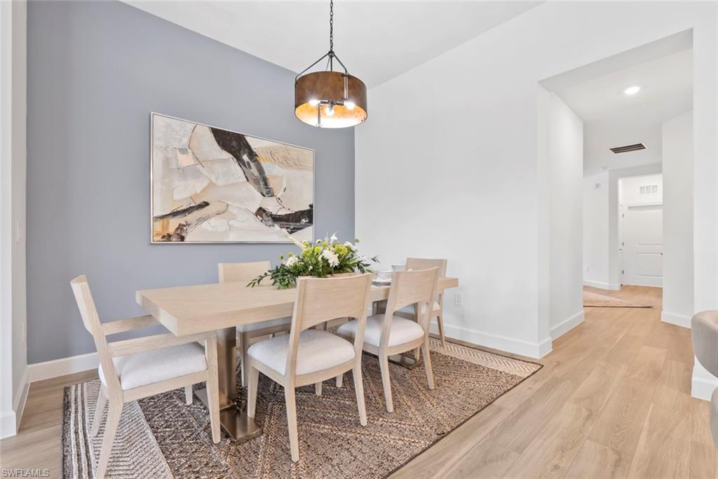 Dining room featuring light hardwood / wood-style floors