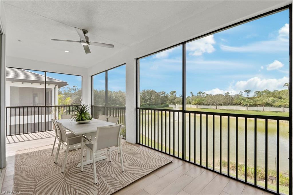 Sunroom featuring ceiling fan
