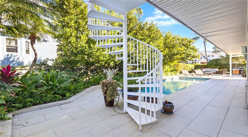 Outdoor pool featuring a patio area and outdoor seating