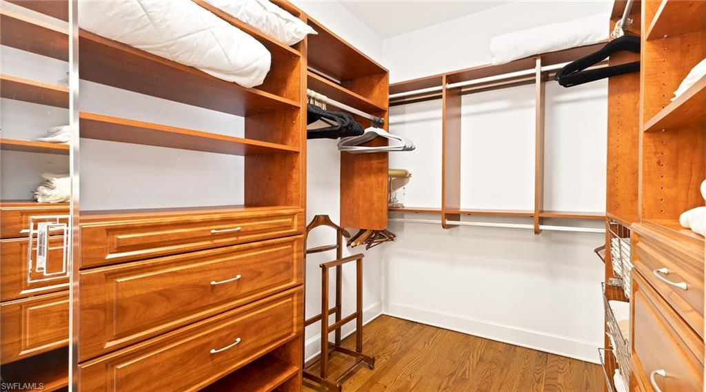 Walk in closet featuring light wood finished floors