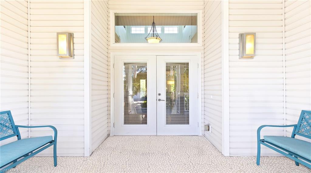 Doorway to property featuring french doors