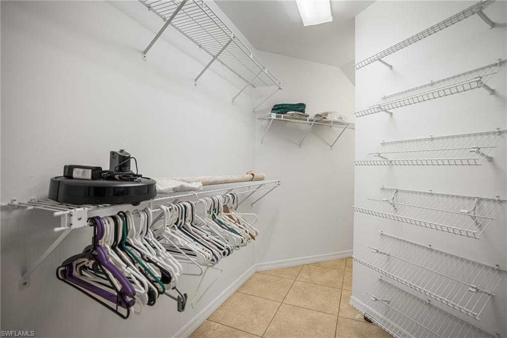 The first-floor primary suite has a huge walk-in closet, including "wrap around" space under the stairs for extra storage.