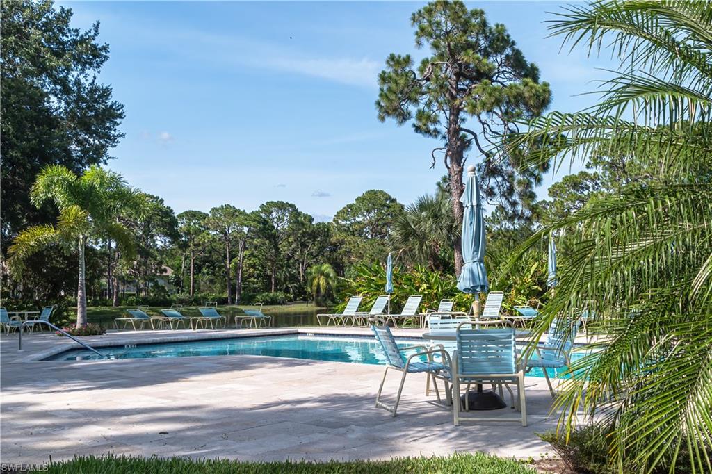 Lounge luxuriously lakeside at the community pool.