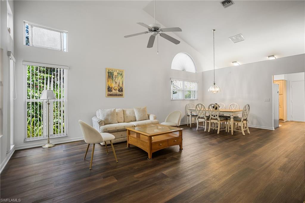 Spacious great room has vaulted ceilings, great light and so much room!