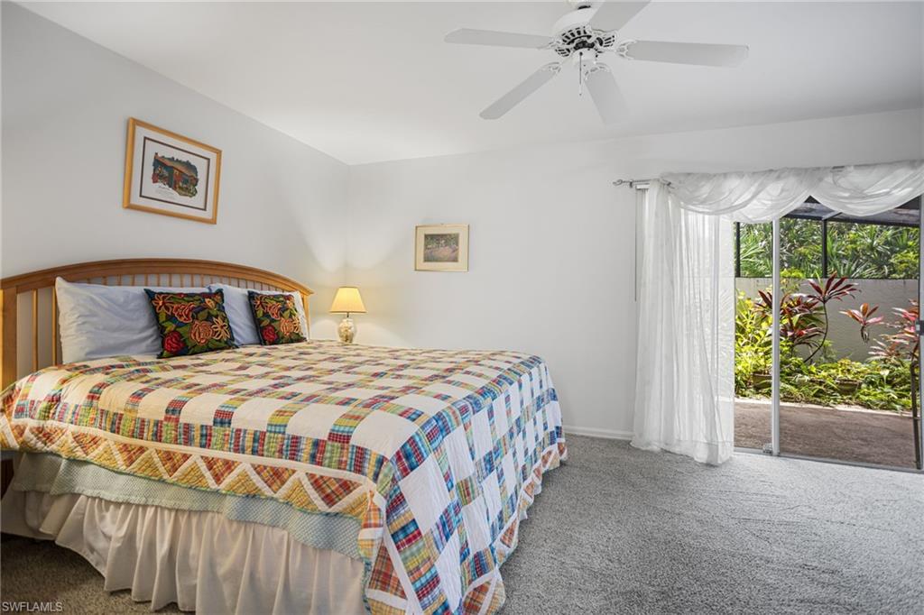 The first-floor primary suite has room for a king bedroom set plus sitting area, and has direct access to the screened lanai.