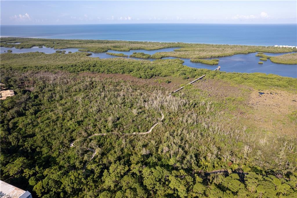 The walking paths lead to a boardwalk that extends through a natural preserve into the back bay