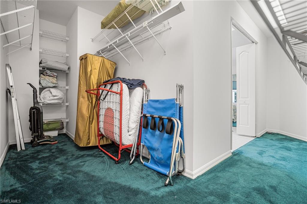 Wow! The second-floor primary suite has a an even bigger walk-in closet, including even more "wrap around" space for more storage or work/play space.