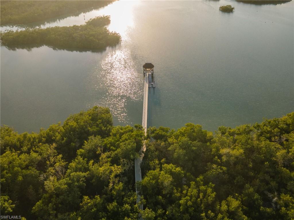 The walking paths lead to a boardwalk that extends through a natural preserve into the back bay, finishing with a relaxing tiki hut and a paddle-sport launch ramp.