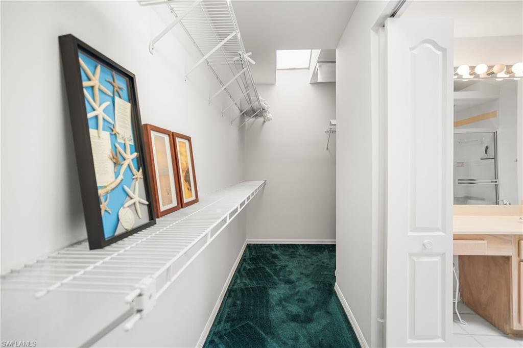 Wow! The second-floor primary suite has a an even bigger walk-in closet, including even more "wrap around" space for more storage, or or work/play space.