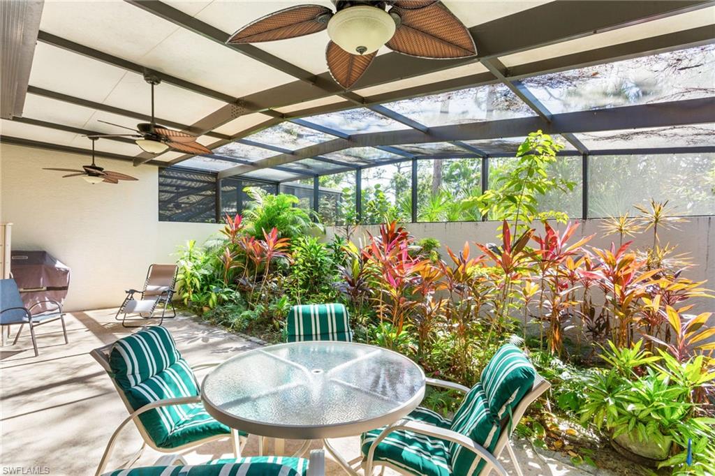 The extra-large screened lanai offers space for both dining and lounging, plus lush tropical foliage (or you can finish that for even more space!). A partial wall ensures privacy while still letting in the sun and soothing sounds of nature.