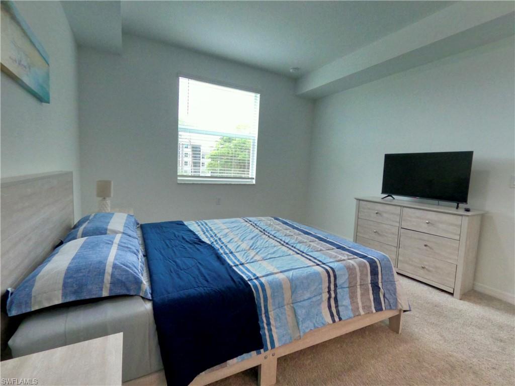 Bedroom featuring carpet flooring