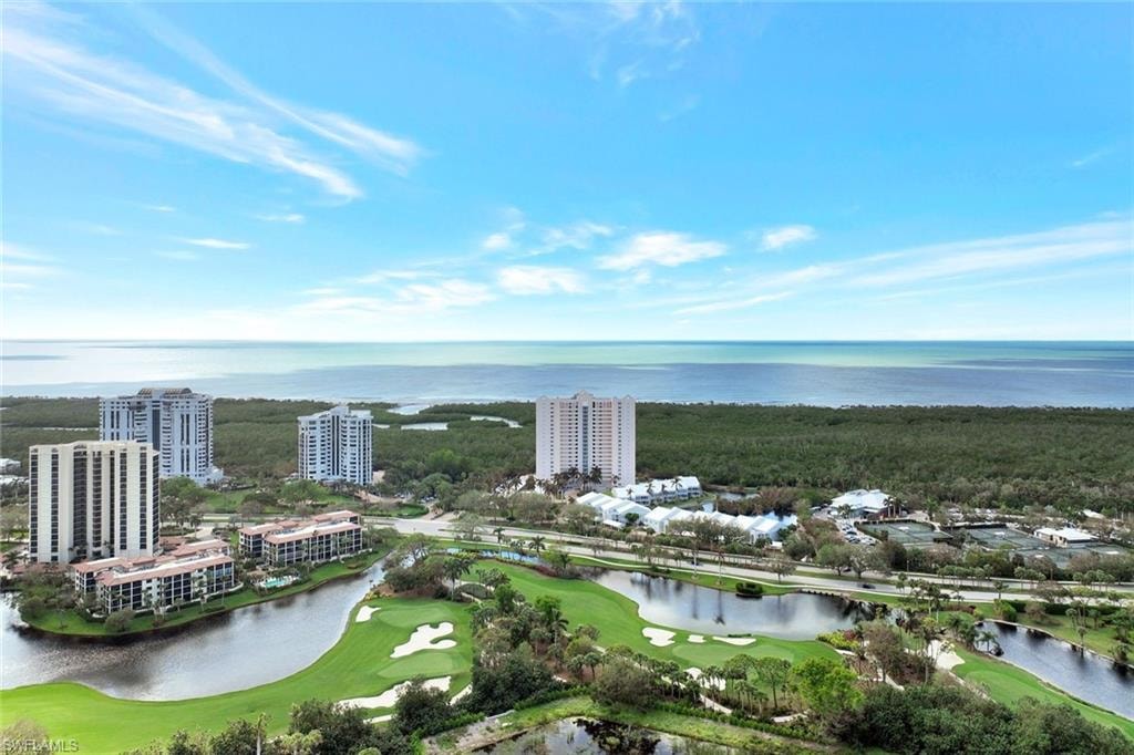 Bird's eye view of a nearby body of water and a golf course