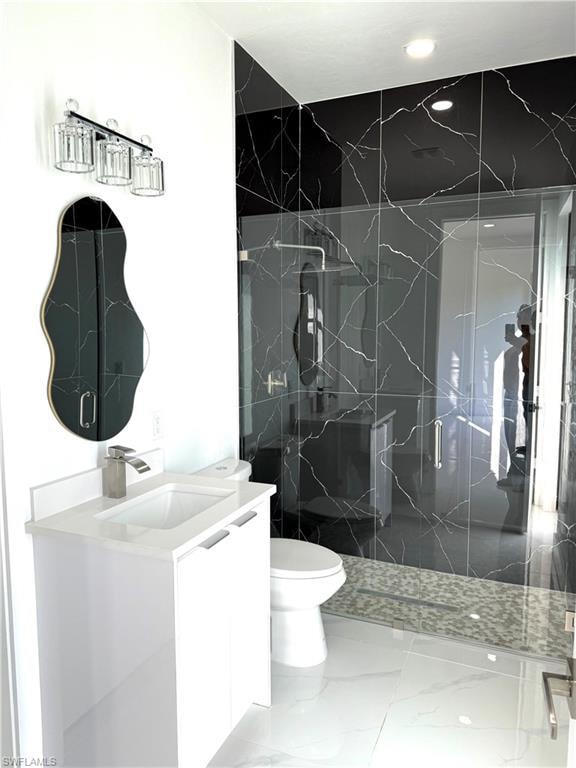 Unfurnished room with light marble finish flooring