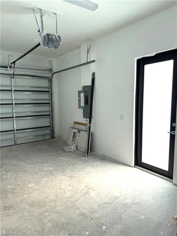 Hallway featuring light marble finish flooring and recessed lighting