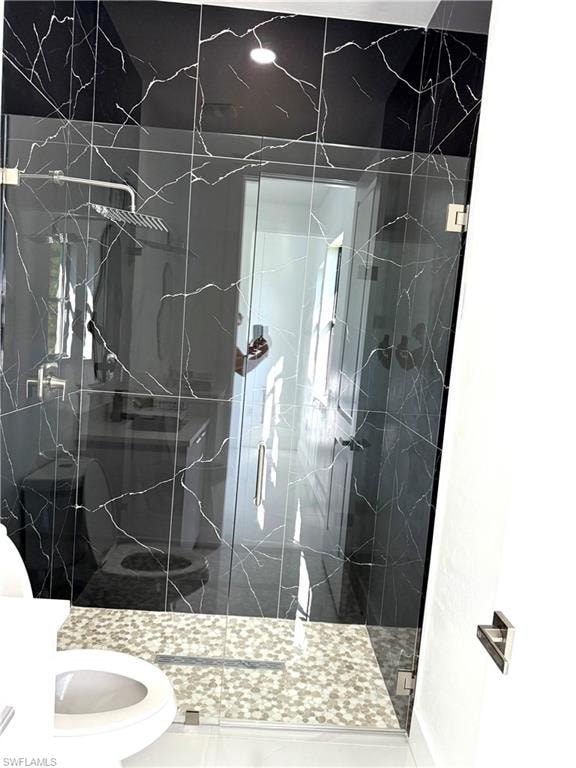 Spare room with light marble finish floors