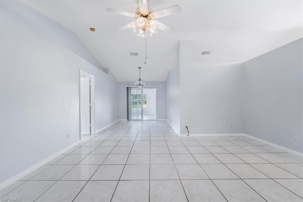 Full bathroom featuring vanity, bathtub / shower combination, and light tile patterned floors