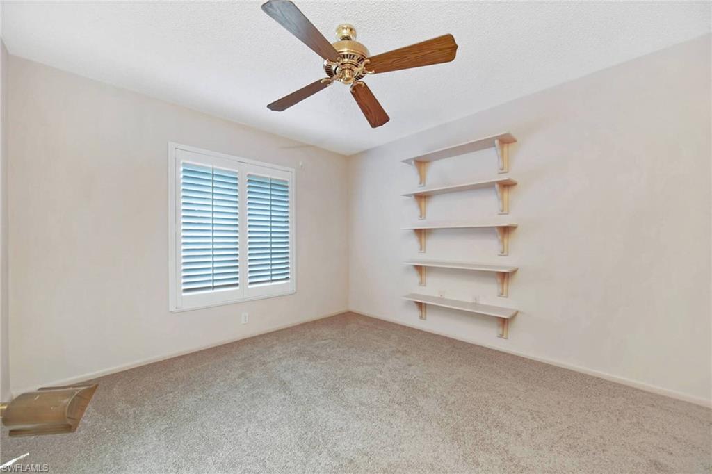 Guest bedroom #2 with shelving