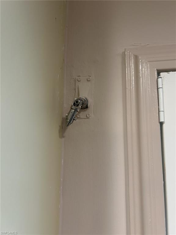 Attachment to maneuver hurricane shutters from inside
