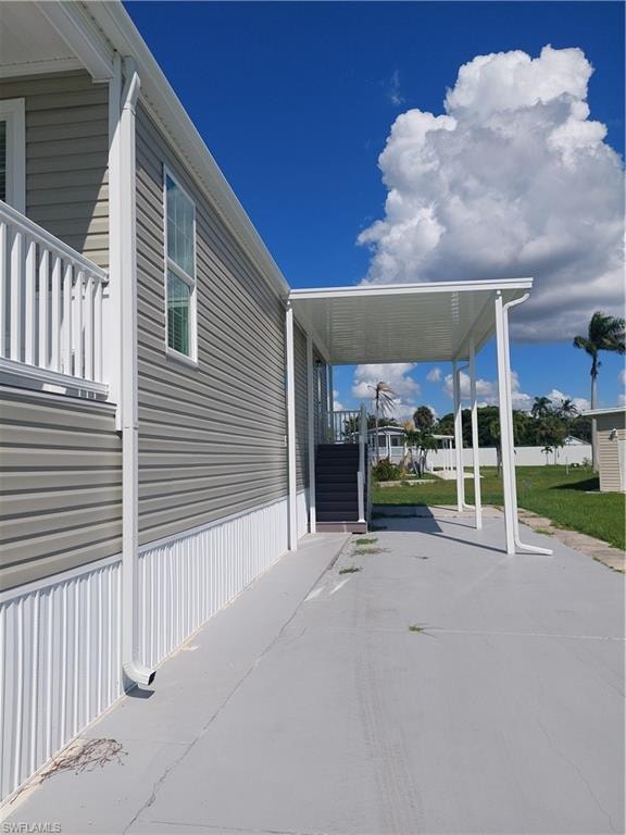 Carport and Driveway-long enough for two vehicles plus a golf cart!