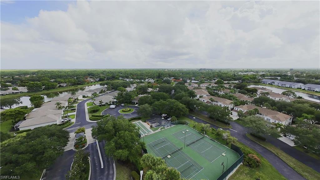 Aerial perspective showcasing a residential community with mature landscaping