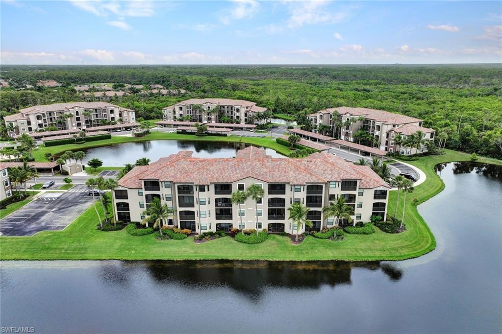 Bird's eye view of a heavily wooded area and a large body of water