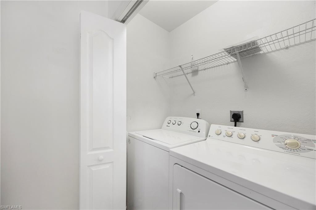 Laundry room featuring washing machine and dryer