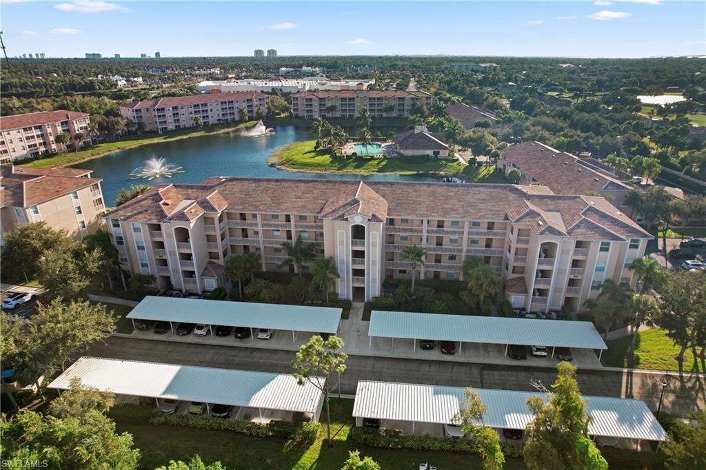 Bird's eye view of apartment complex / building and a large body of water