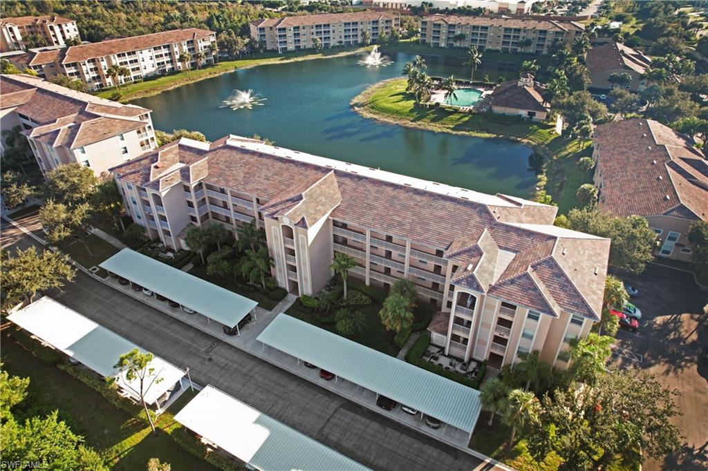 Bird's eye view of apartment complex / building and a large body of water