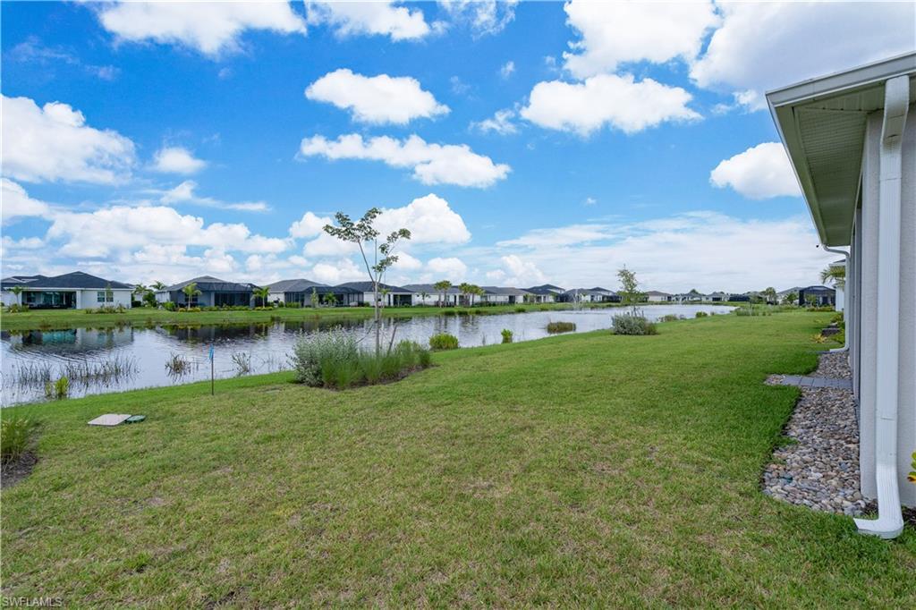 Water view featuring nearby suburban area
