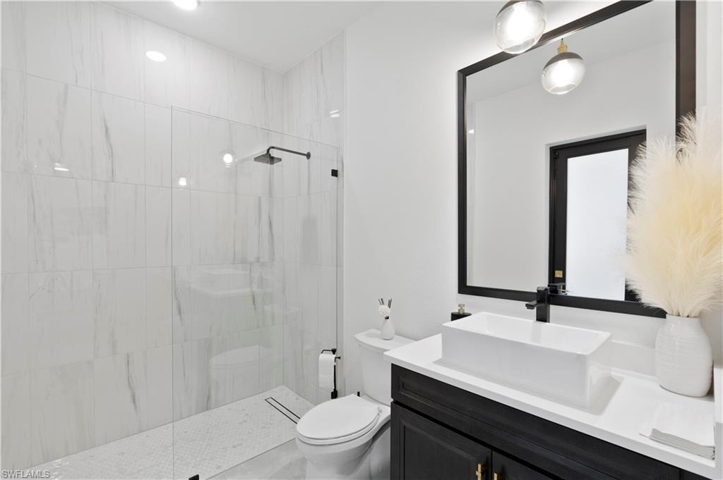 Bathroom with a walk in shower and vanity