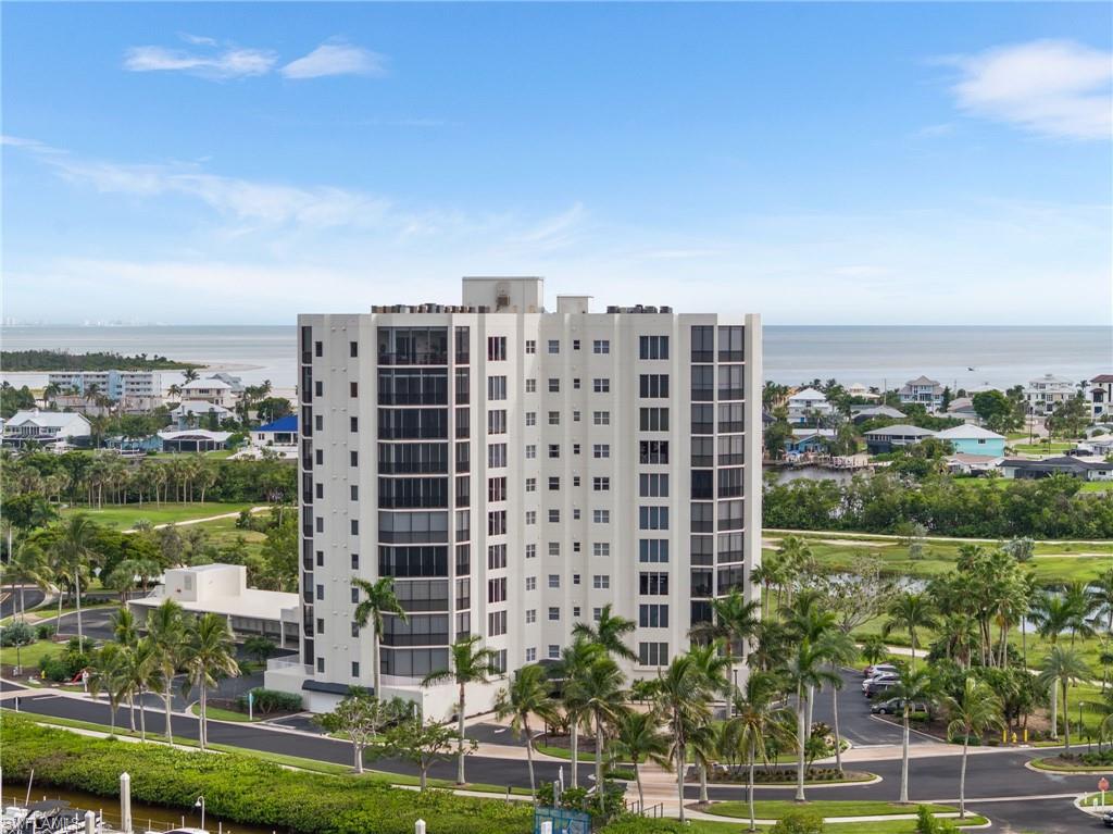 View of apartment building / complex with a water view
