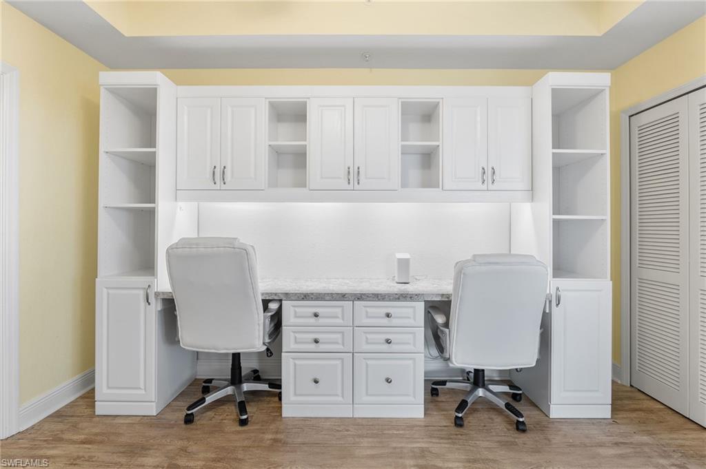 Office flex space and murphy bed featuring light wood-type flooring