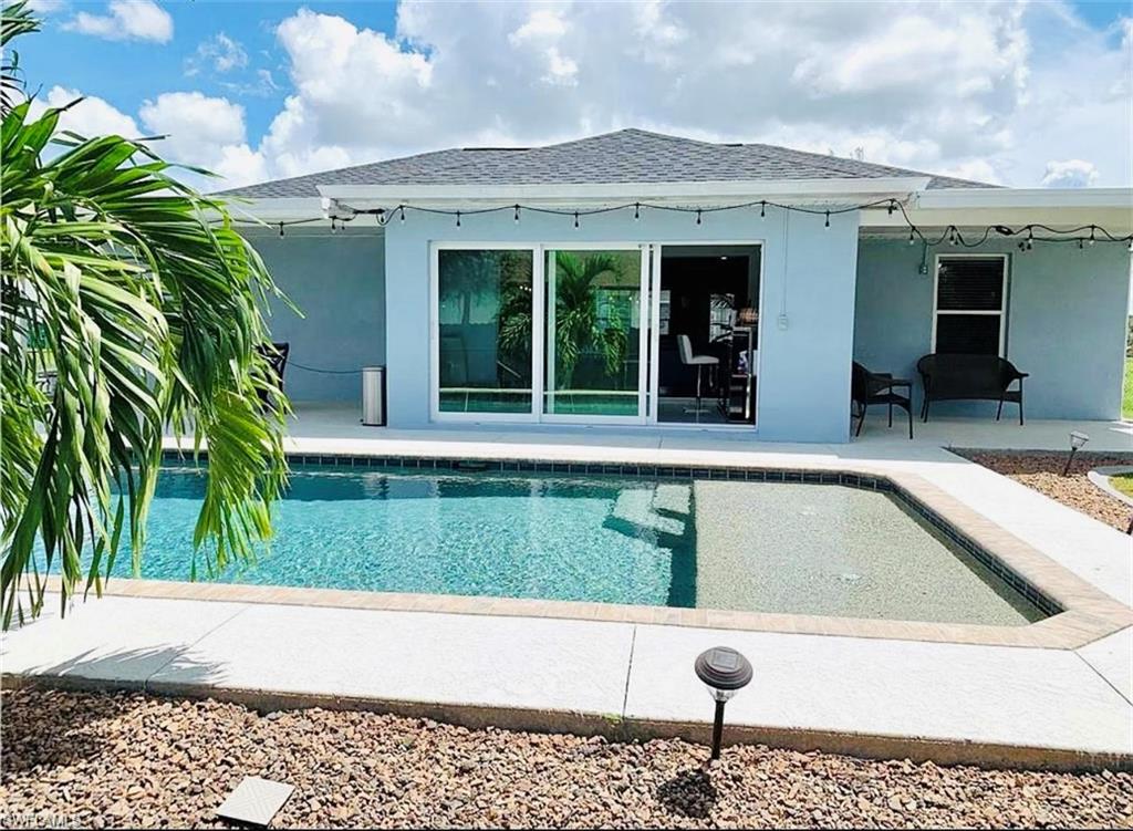 Outdoor pool with a patio