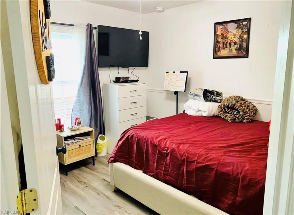 Bedroom featuring light wood-type flooring