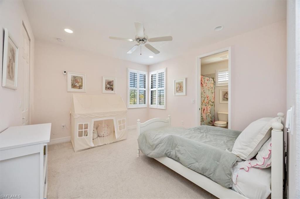 Bedroom with carpet floors, recessed lighting, ceiling fan, and connected bathroom