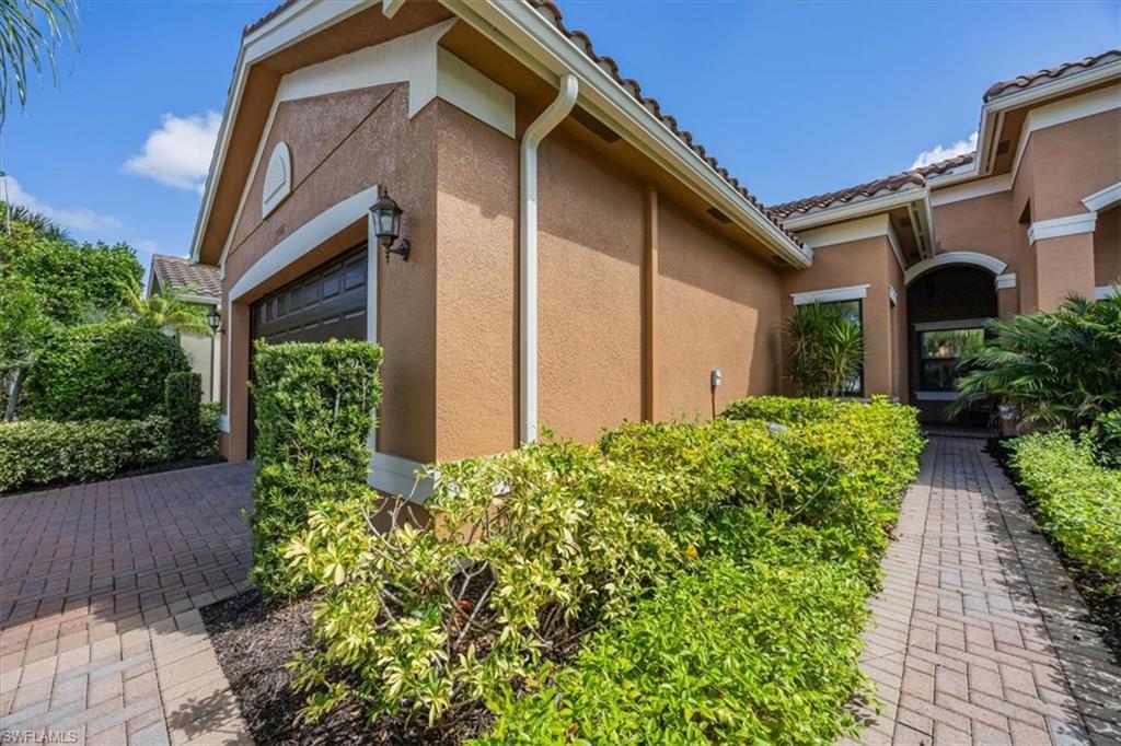 View of home's exterior featuring stucco siding