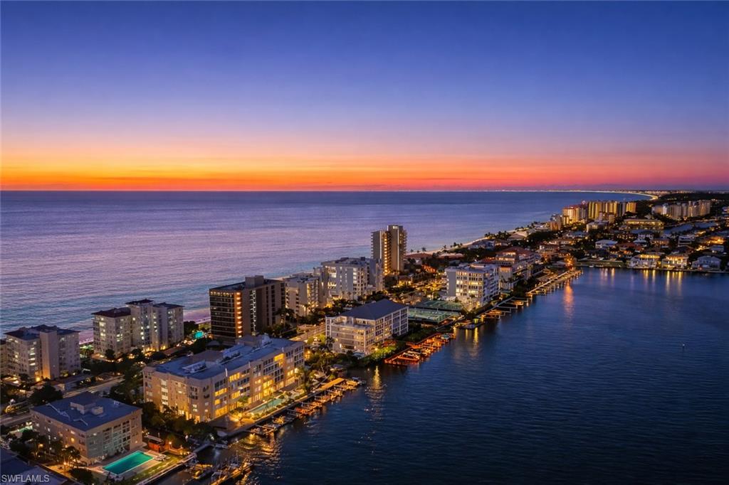 Aerial view at dusk of a water view and a city view
