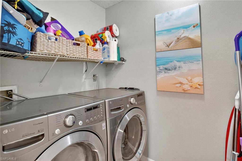 Washroom featuring LG Stainless washer and dryer